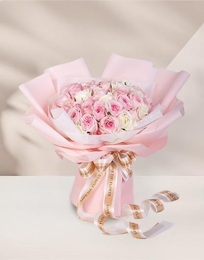 ช่อดอกไม้ชมพูขาว สื่อถึงความรักที่ไม่อาจถอนตัว ให้แฟนในวันขอแต่งงานหรือขอหมั้น พร้อมร่วมทำบุญกับมูลนิธิ